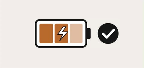 Battery and checkmark illustration for the final charging and playback check.
